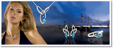 Demeter Harvest 11 Collection - Fine diamond jewelry with exquisite curves accentuating the London blue topaz gemstone.